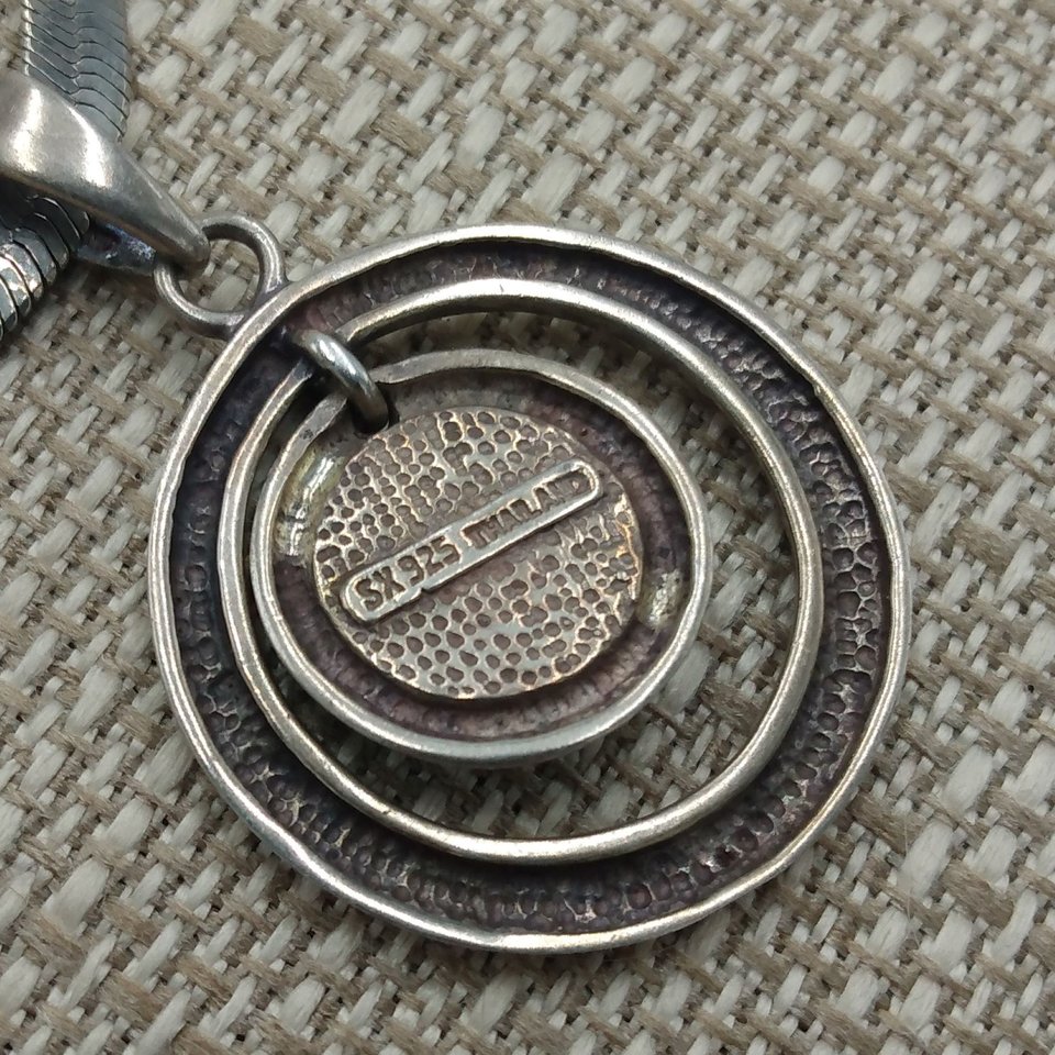 Sterling Silver and Genuine Turquoise Pendant with a Silver Tone Herringbone Chain