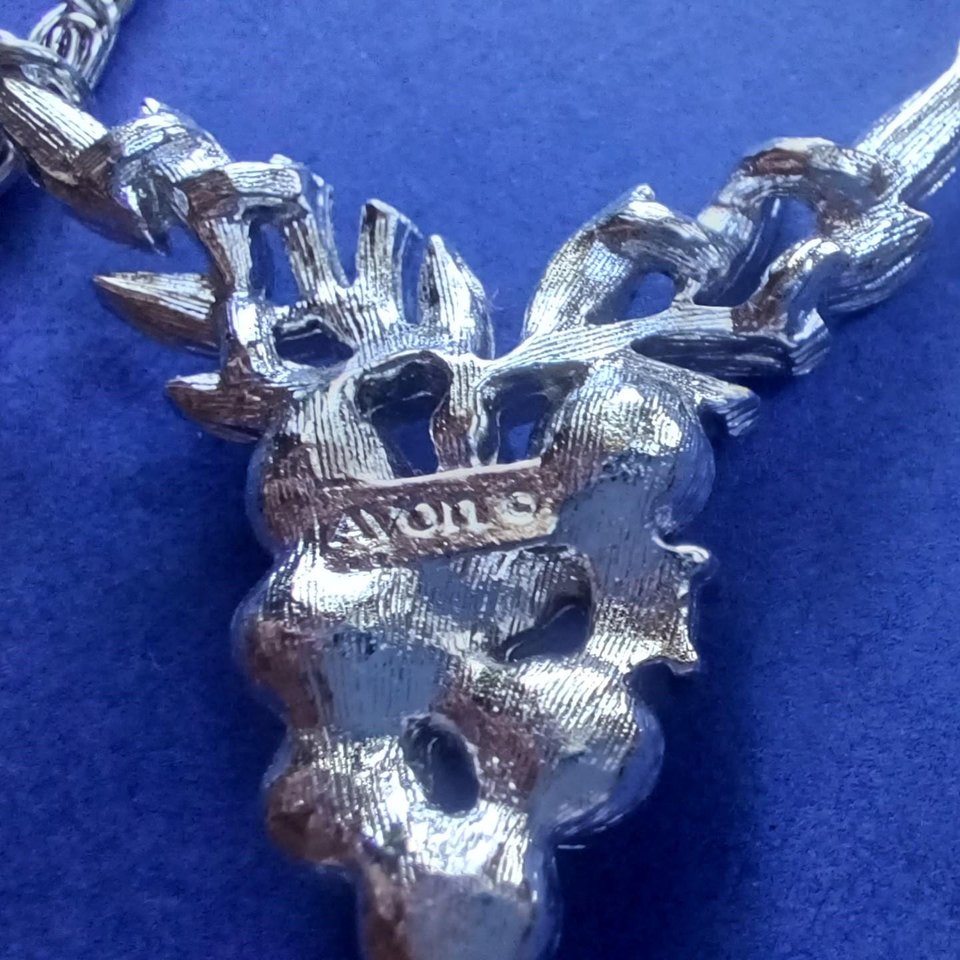 AVON Silver Tone Snail Chain With Faux Pearl and Rhinestones Grapes Center Pendant